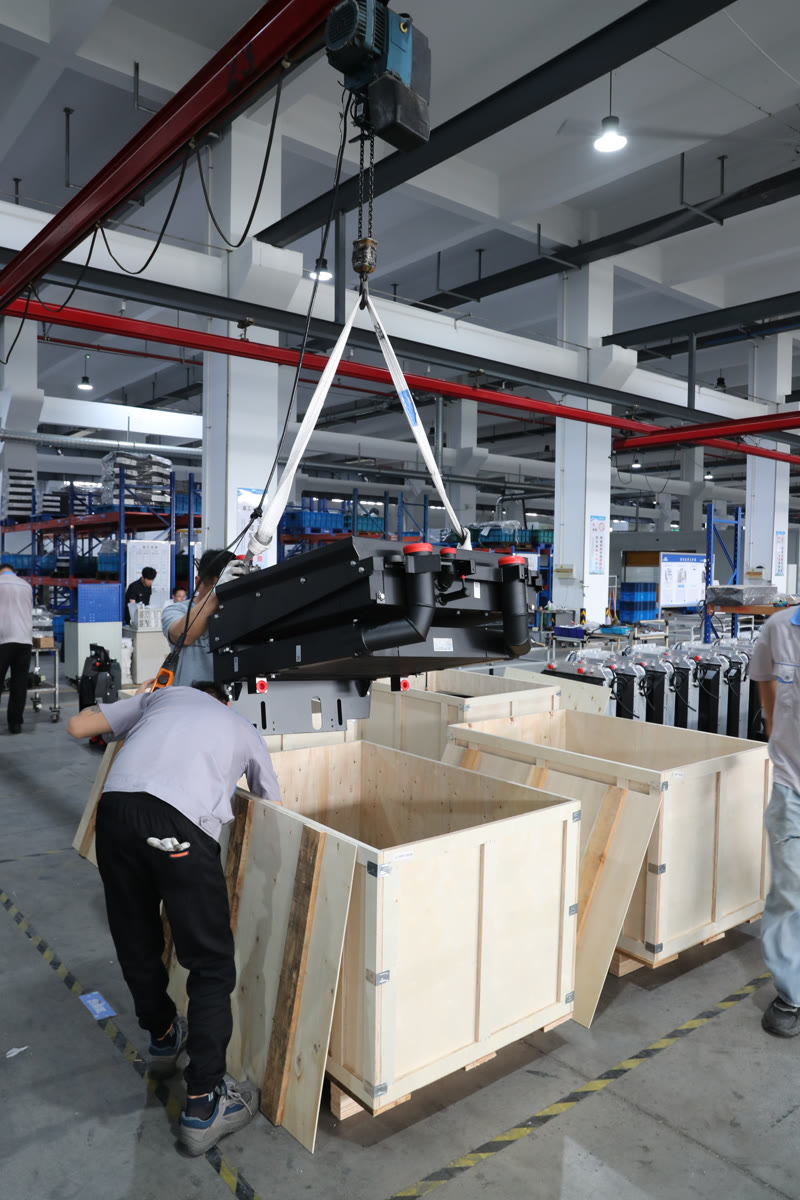Finished cooling modules being packed for export shipment